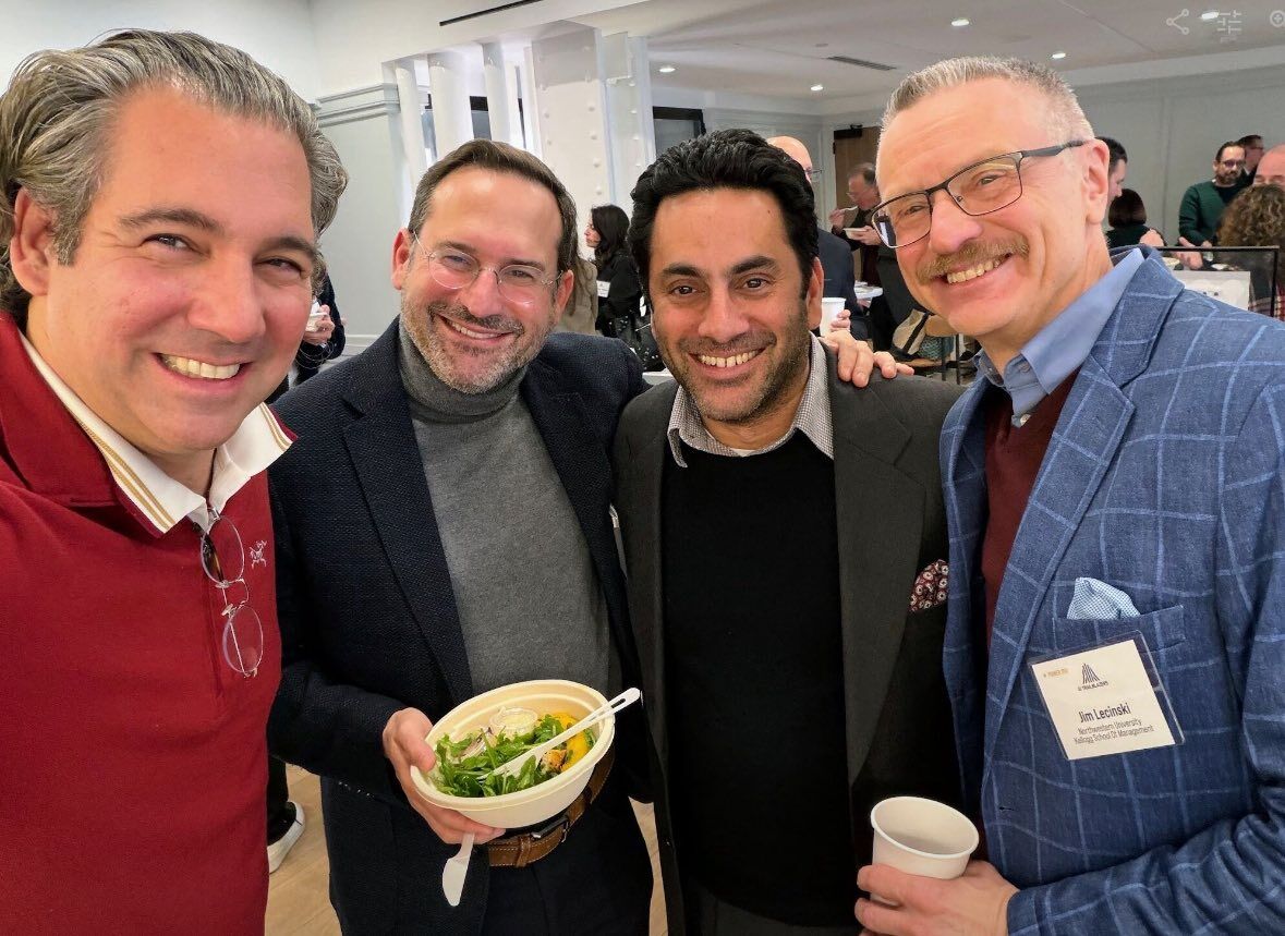 Guests networking during a break at an AI Trailblazers summit