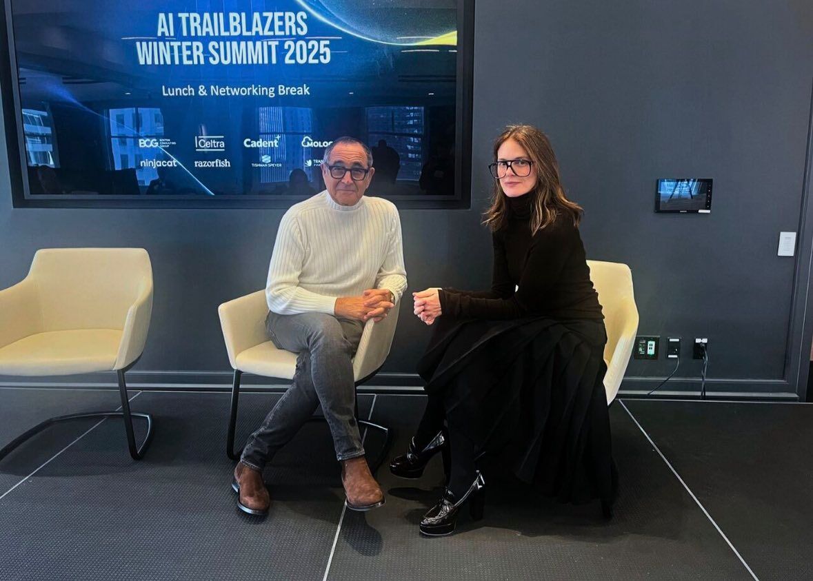 Speakers seated ahead of a session at the AI Trailblazers Winter Summit