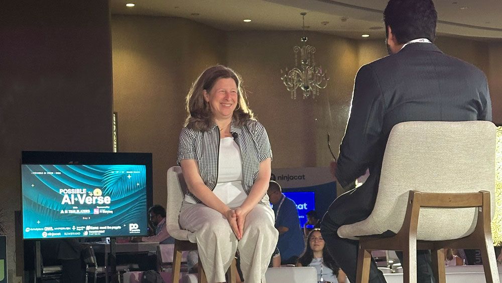 One-on-one interview on stage at an AI Trailblazers session