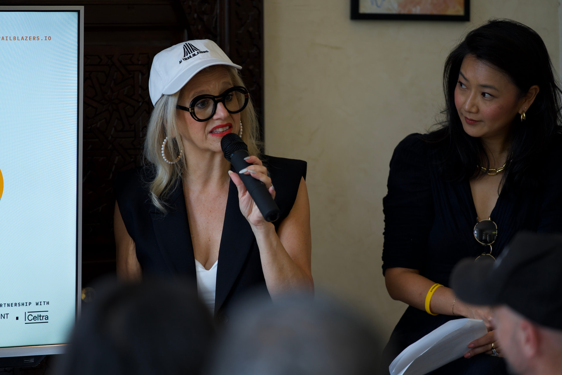Speaker addressing the room during a Cannes AI Trailblazers session